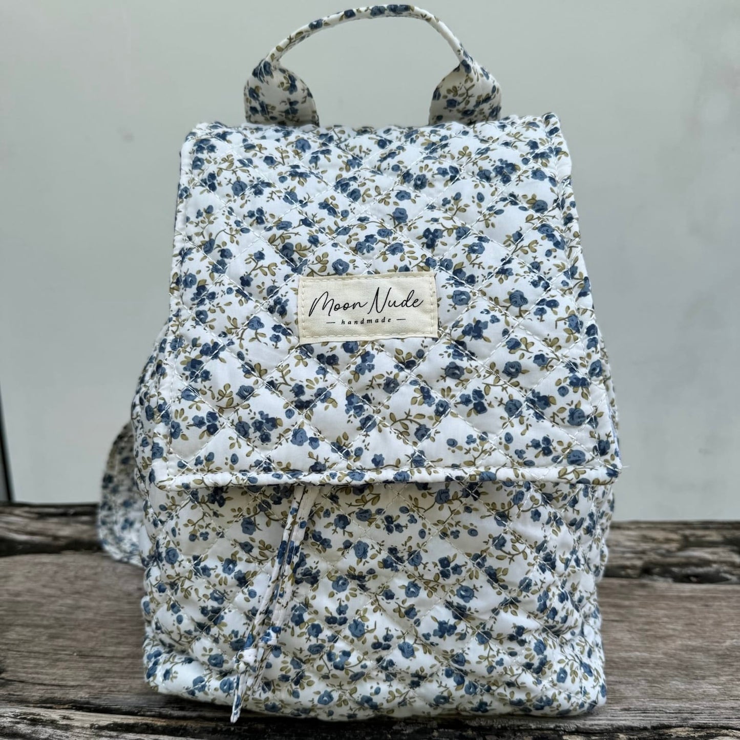 Spring Flap Backpack